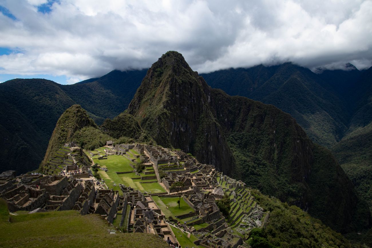 The Inca citadel of Machu Picchu framed by green Andean peaks